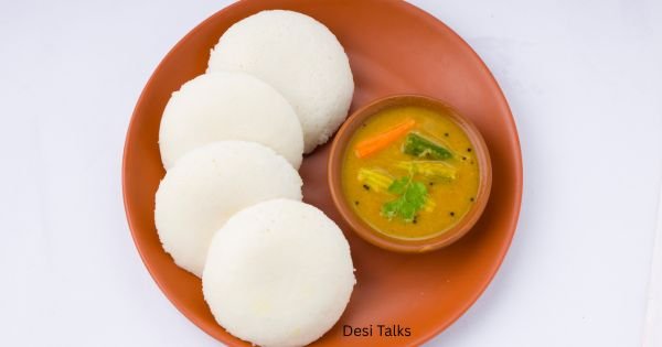Illustration of Google Doodle showcasing the making of idli, a traditional South Indian dish served with sambar and chutney.