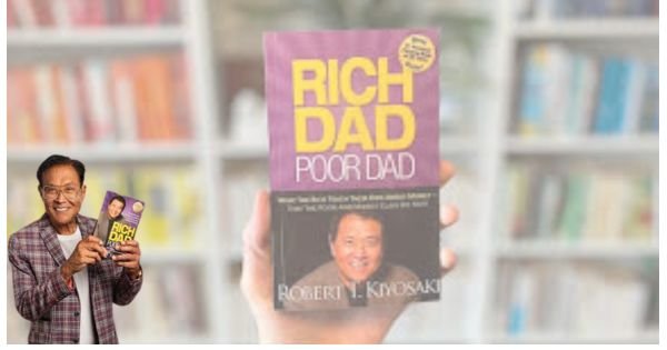 Rich Dad Poor Dad Author Robert Kiyosaki Holding His Iconic Book